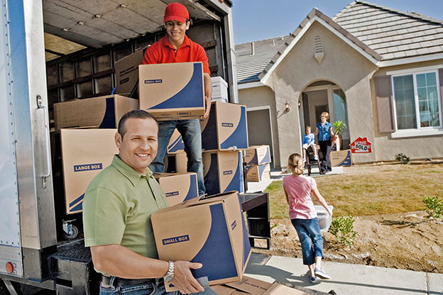 family with moving boxes