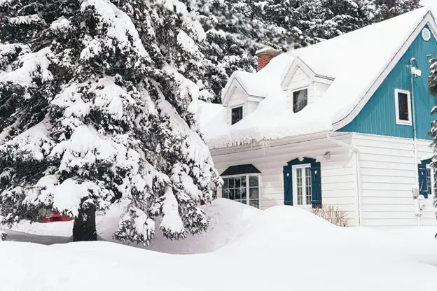 winter scene, house covered in snow